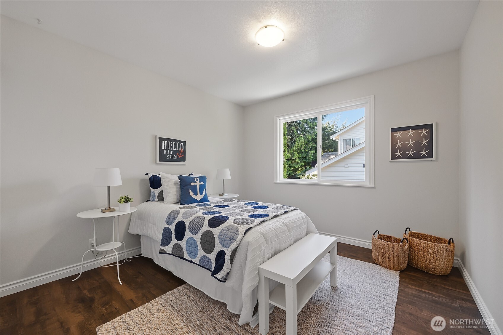 23707 Meridian Place West Bothell, WA 98021 - Photo 22 of 40 a bed room with a bed and a couch