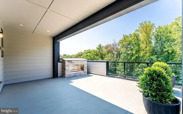 a view of balcony with furniture