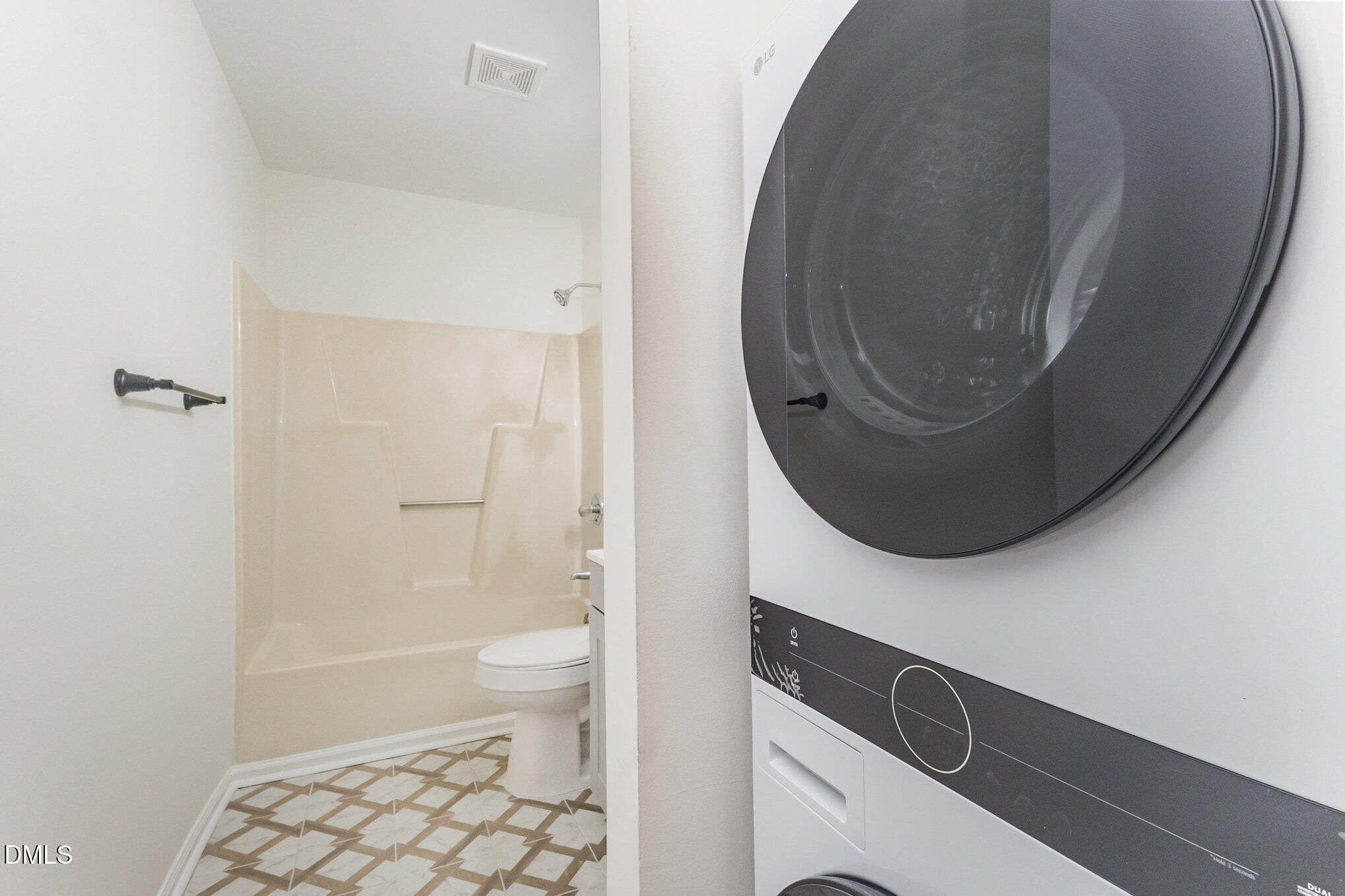 3559 Mill Run Raleigh, NC 27612 - Photo 20 of 28 a bathroom with a toilet and a mirror