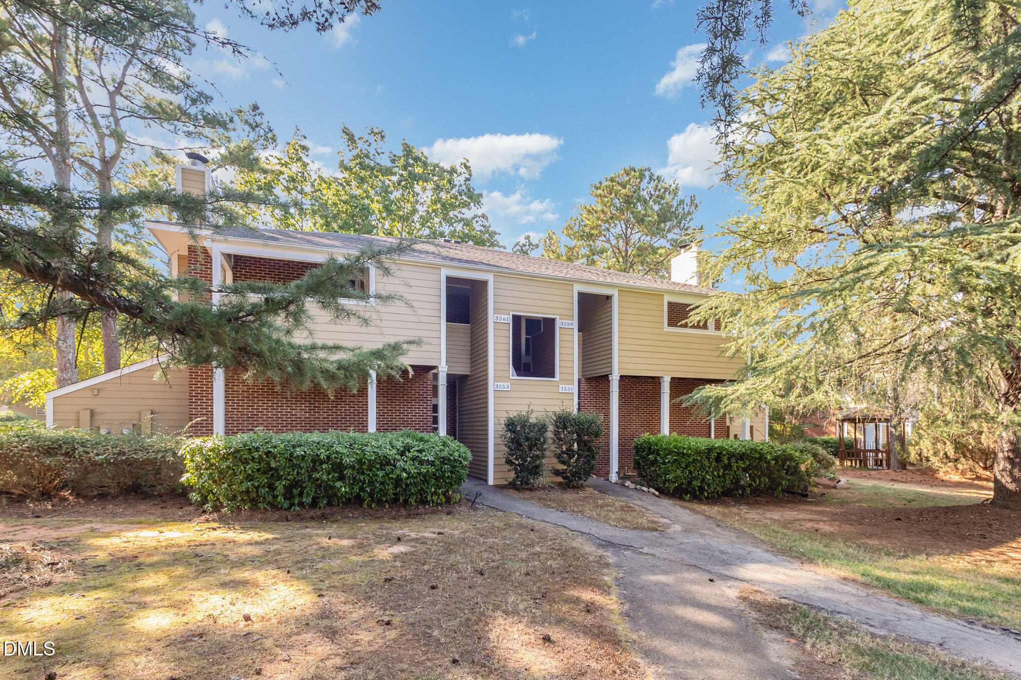3559 Mill Run Raleigh, NC 27612 - Photo 3 of 28 a view of a house with a yard
