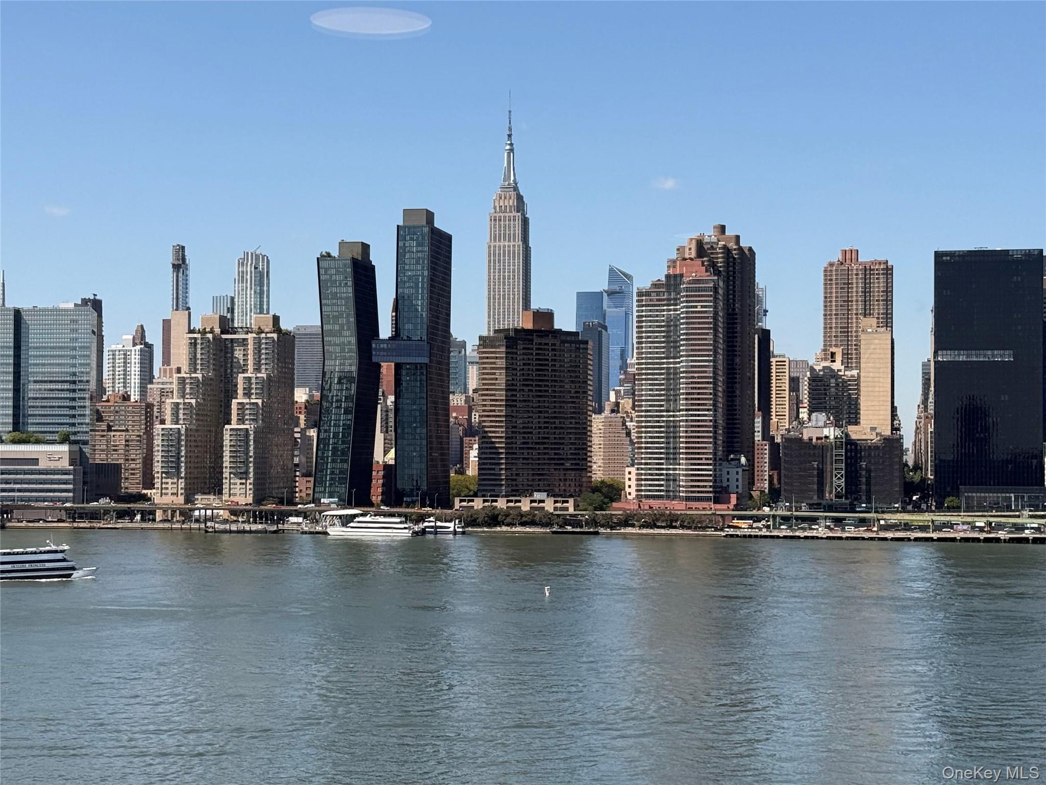 52-03 Center Boulevard, Unit 928 Queens, NY 11101 - Photo 10 of 13 a view of water with tall building