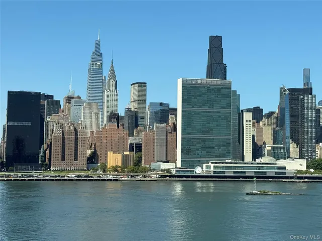 a view of a city with tall buildings