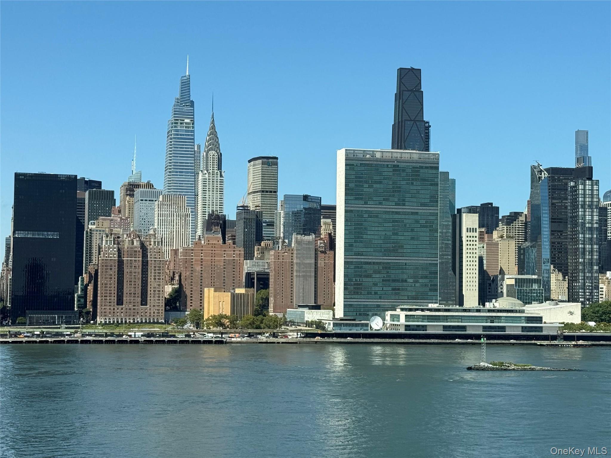 52-03 Center Boulevard, Unit 928 Queens, NY 11101 - Photo 11 of 13 a view of a city with tall buildings