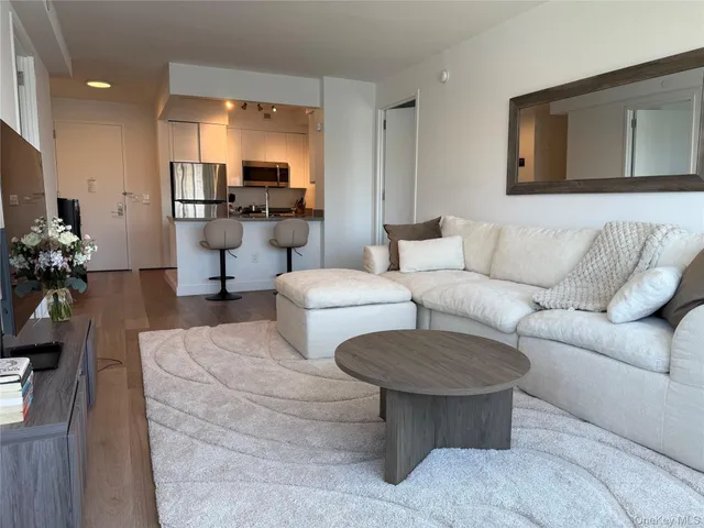 a living room with furniture and a table