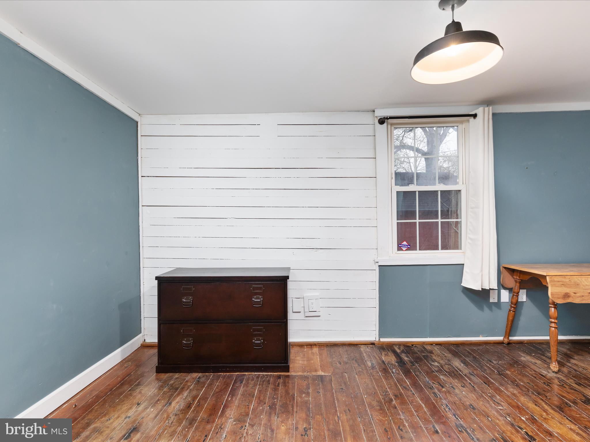 36610 Philomont Road Purcellville, VA 20132 - Photo 15 of 61 a view of a room with wooden floor and a window