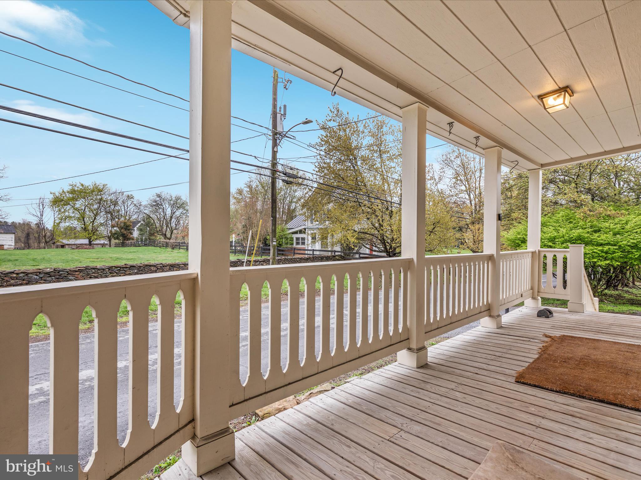 36610 Philomont Road Purcellville, VA 20132 - Photo 29 of 61 a balcony with wooden floor