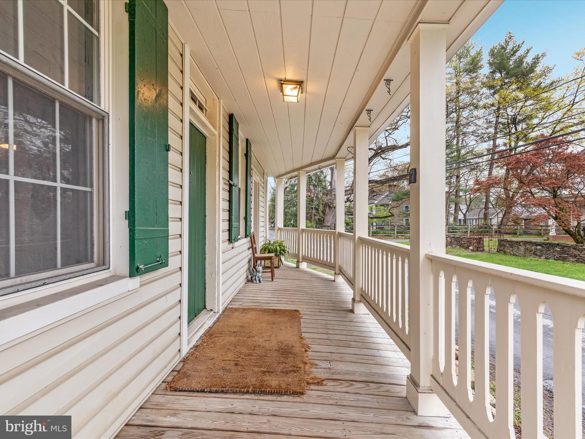 36610 Philomont Road Purcellville, VA 20132 - Photo 30 of 61 a porch with wooden floor and outdoor space