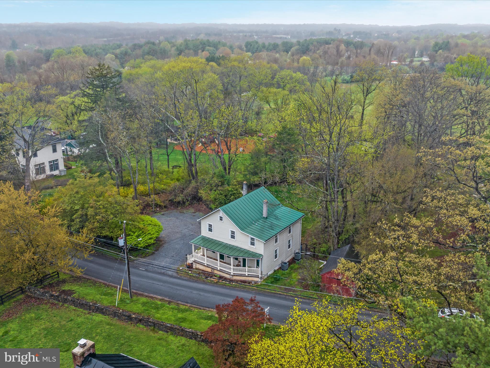 36610 Philomont Road Purcellville, VA 20132 - Photo 44 of 61 an aerial view of a house with a garden
