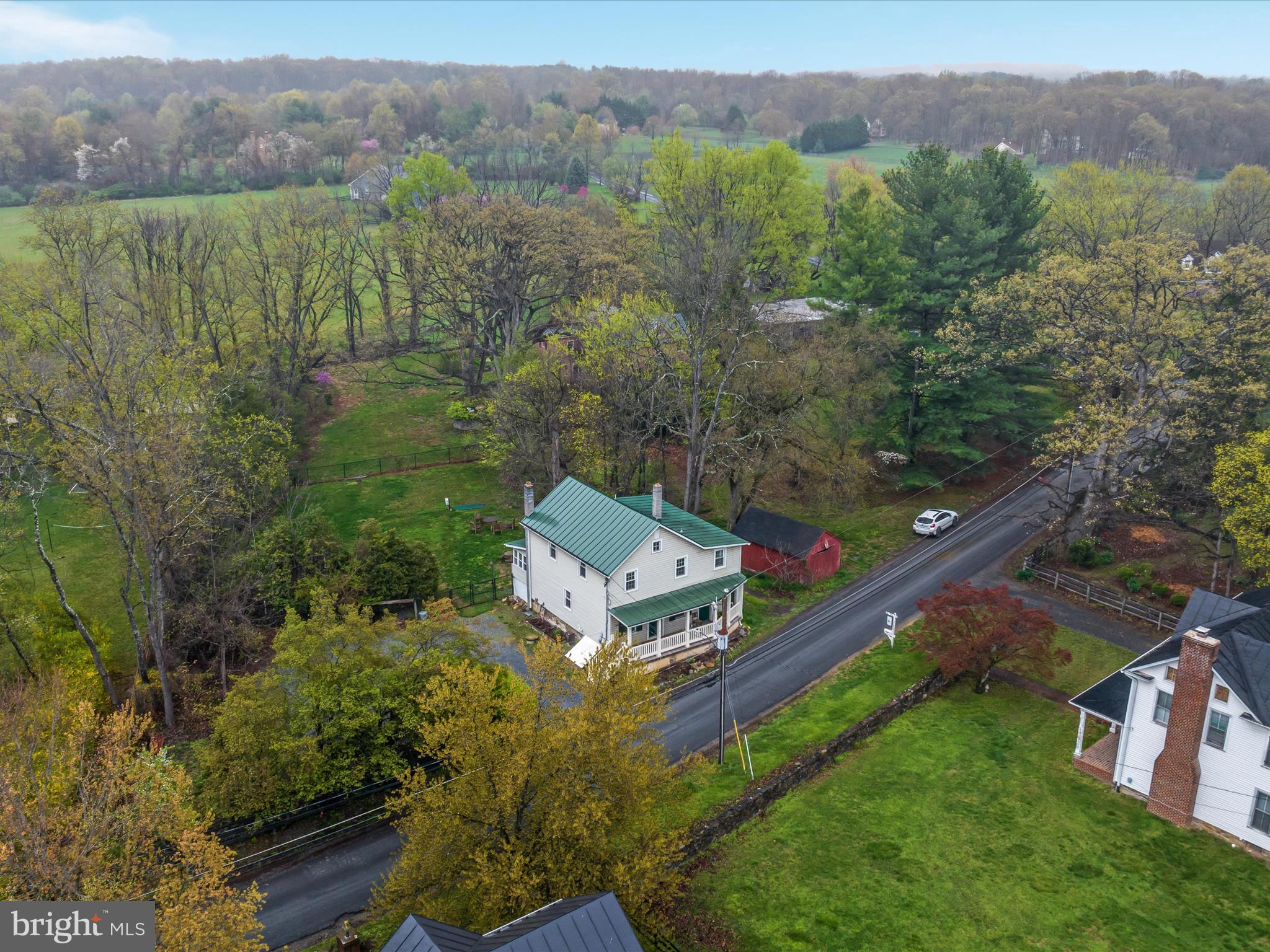 36610 Philomont Road Purcellville, VA 20132 - Photo 45 of 61 an aerial view of a house with a garden