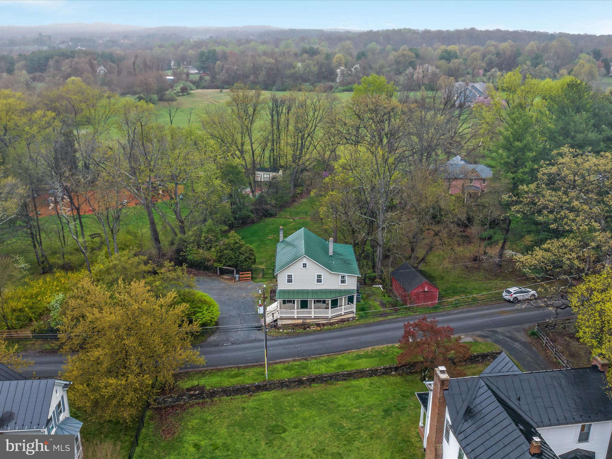 36610 Philomont Road Purcellville, VA 20132 - Photo 46 of 61 a view of a house with a yard
