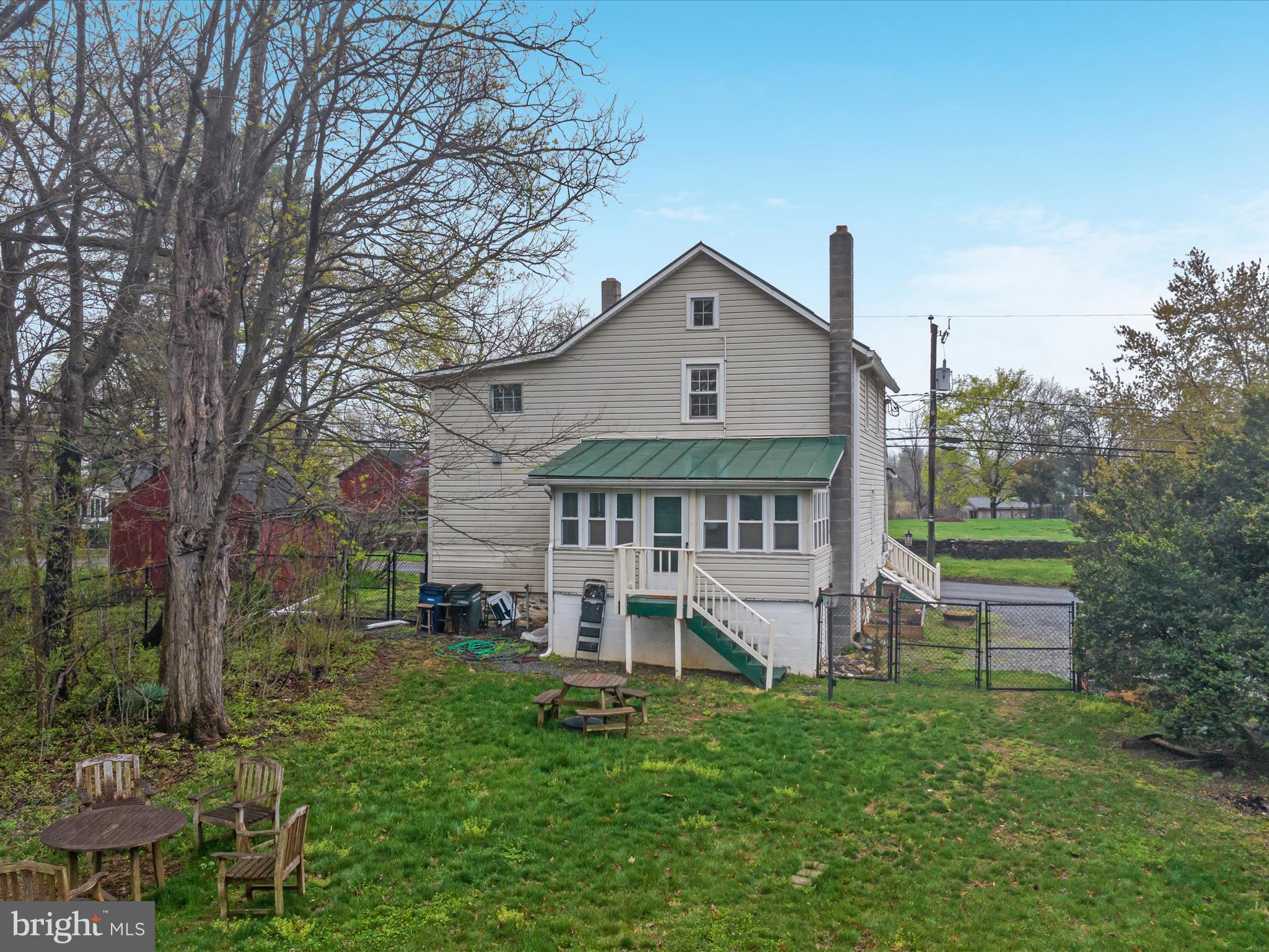 36610 Philomont Road Purcellville, VA 20132 - Photo 50 of 61 a view of a house with a yard