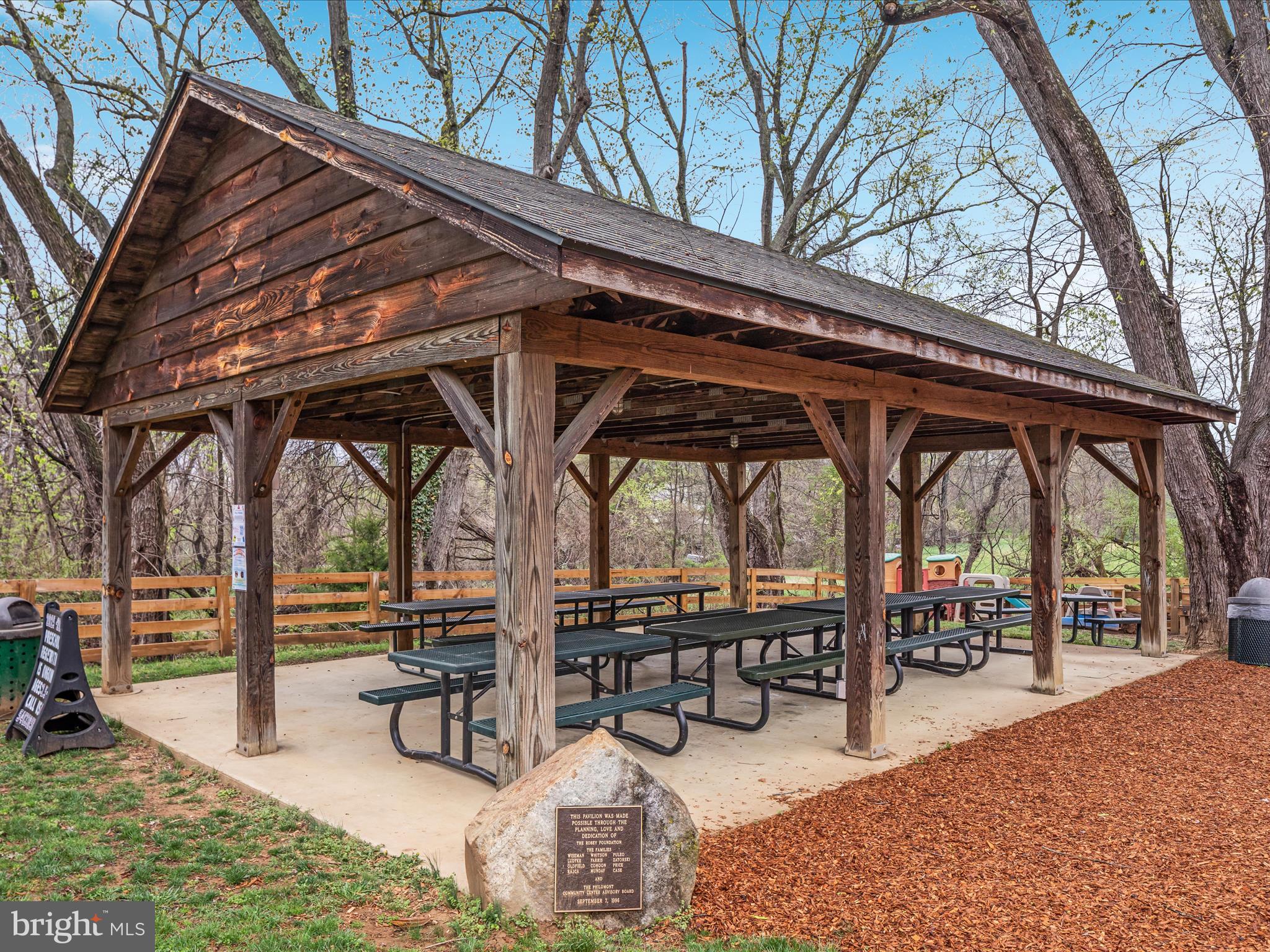 36610 Philomont Road Purcellville, VA 20132 - Photo 58 of 61 a view of wooden roof with a bench and trees