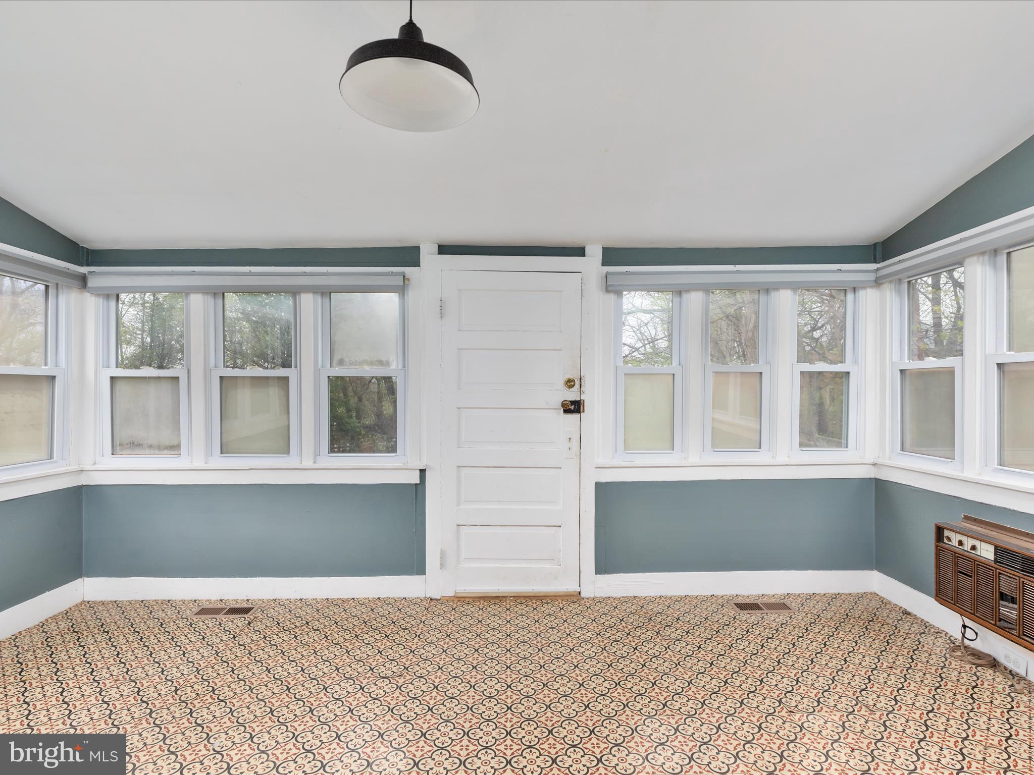 36610 Philomont Road Purcellville, VA 20132 - Photo 9 of 61 a view of an empty room with a window