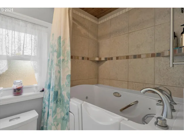 a bathroom with a sink and a bathtub