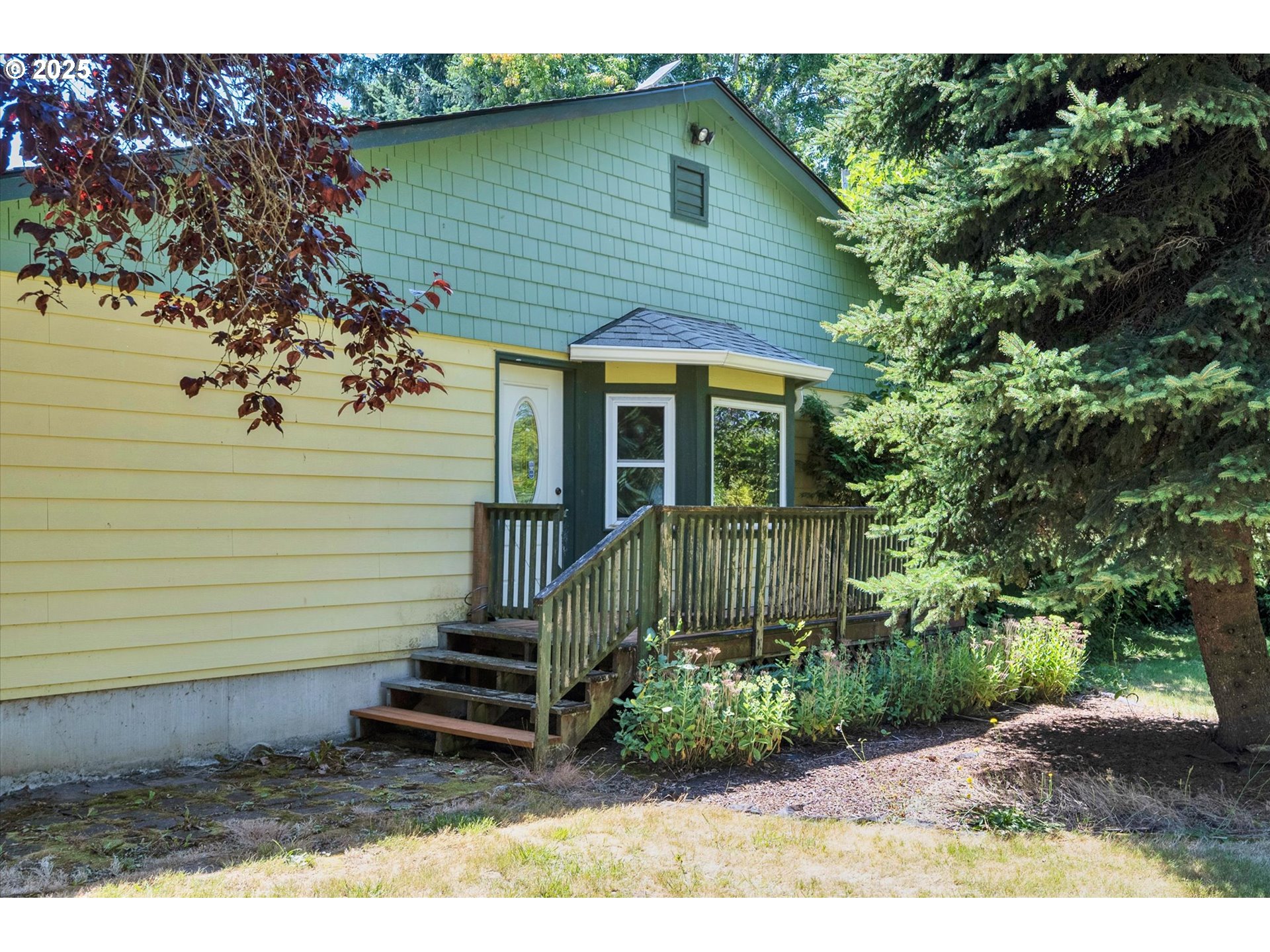 10025 Northeast Ward Road Brush Prairie, WA 98606 - Photo 2 of 33 a view of a house with a yard