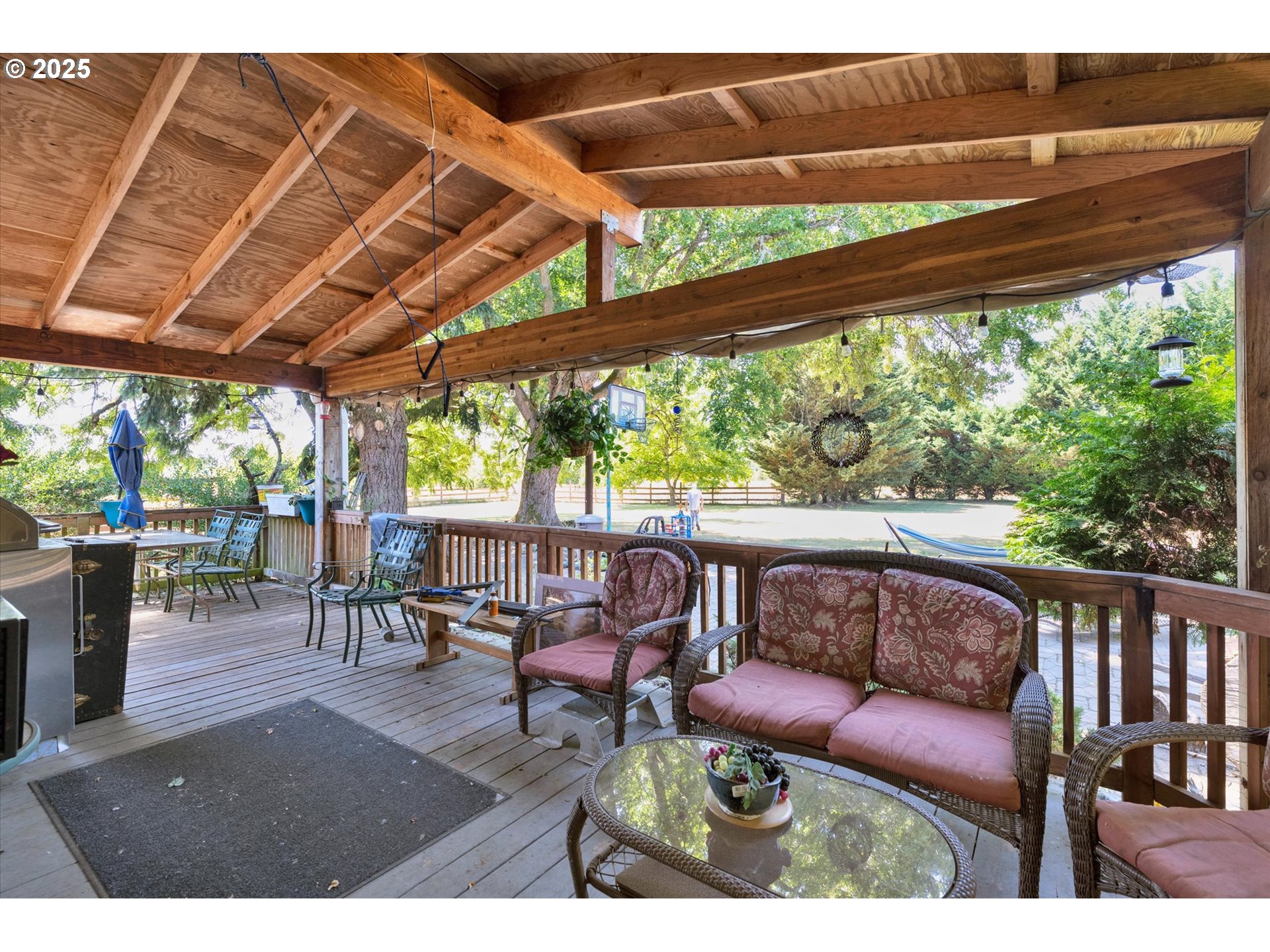 10025 Northeast Ward Road Brush Prairie, WA 98606 - Photo 22 of 33 a view of chairs and a table in the patio