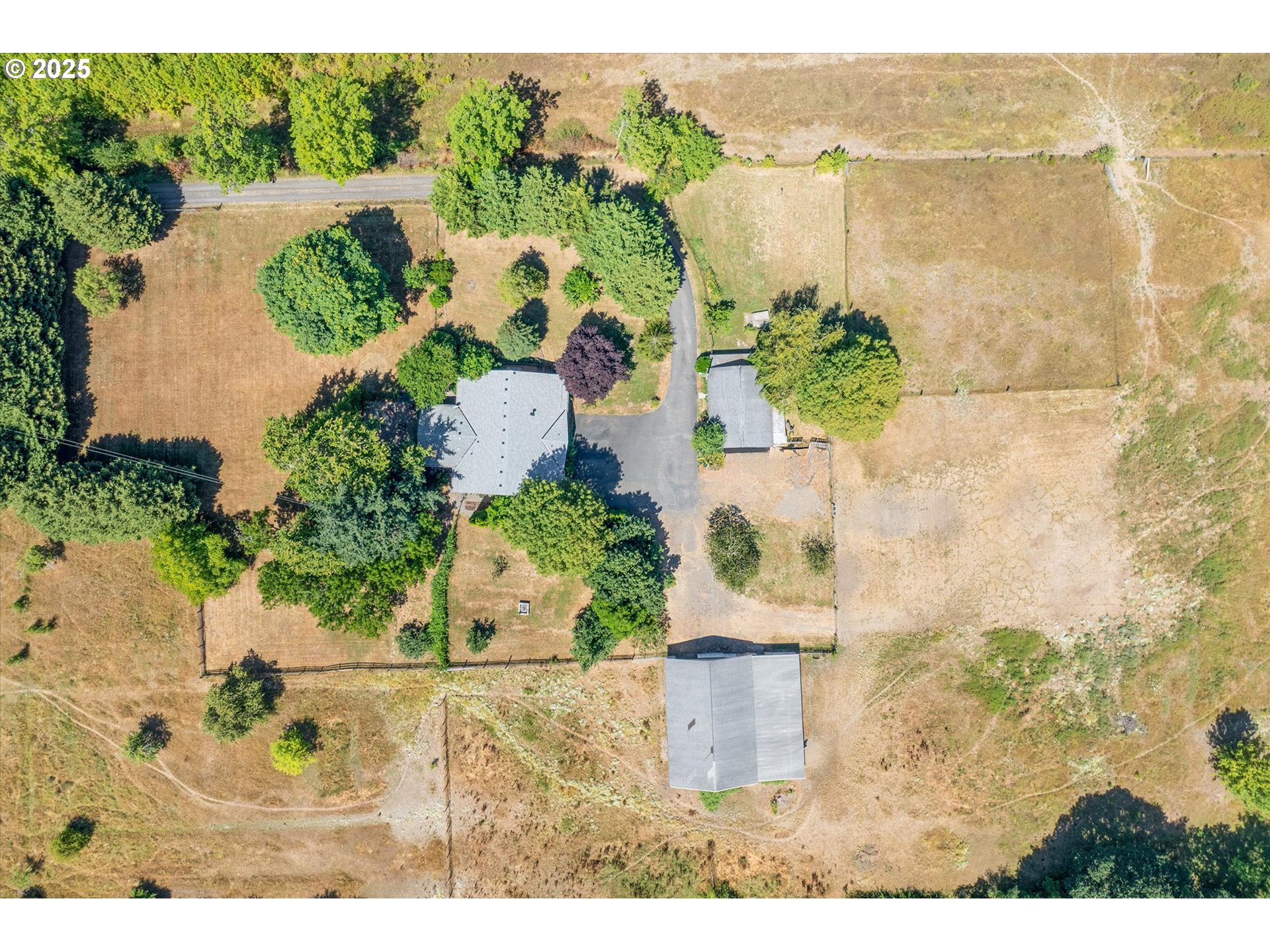 10025 Northeast Ward Road Brush Prairie, WA 98606 - Photo 29 of 33 an aerial view of a house with a yard and lake view