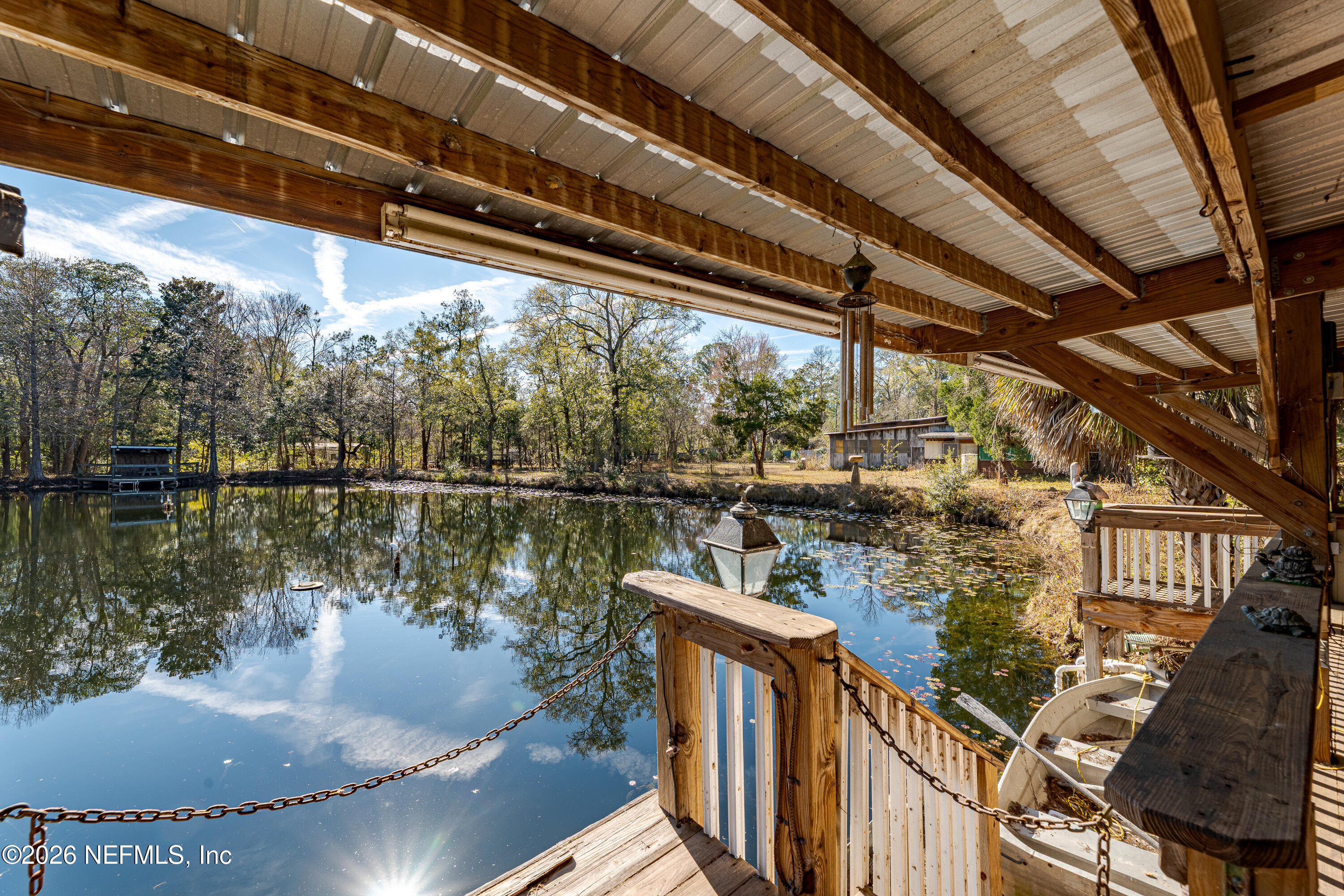 11053 Mulberry Landing Road Hilliard, FL 32046 - Photo 11 of 107 a view of a lake from a balcony