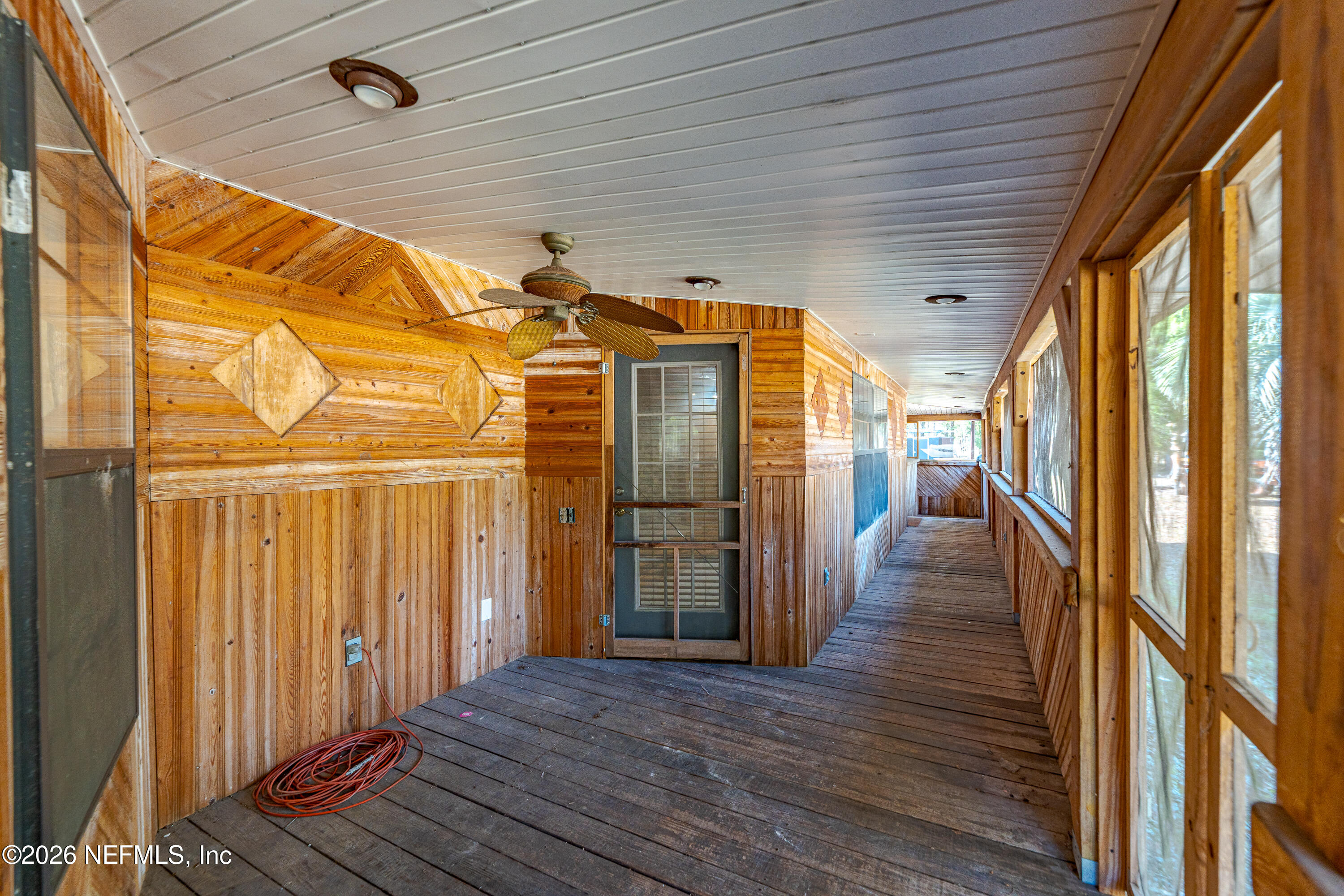 11053 Mulberry Landing Road Hilliard, FL 32046 - Photo 28 of 107 a view of a house with wooden floor