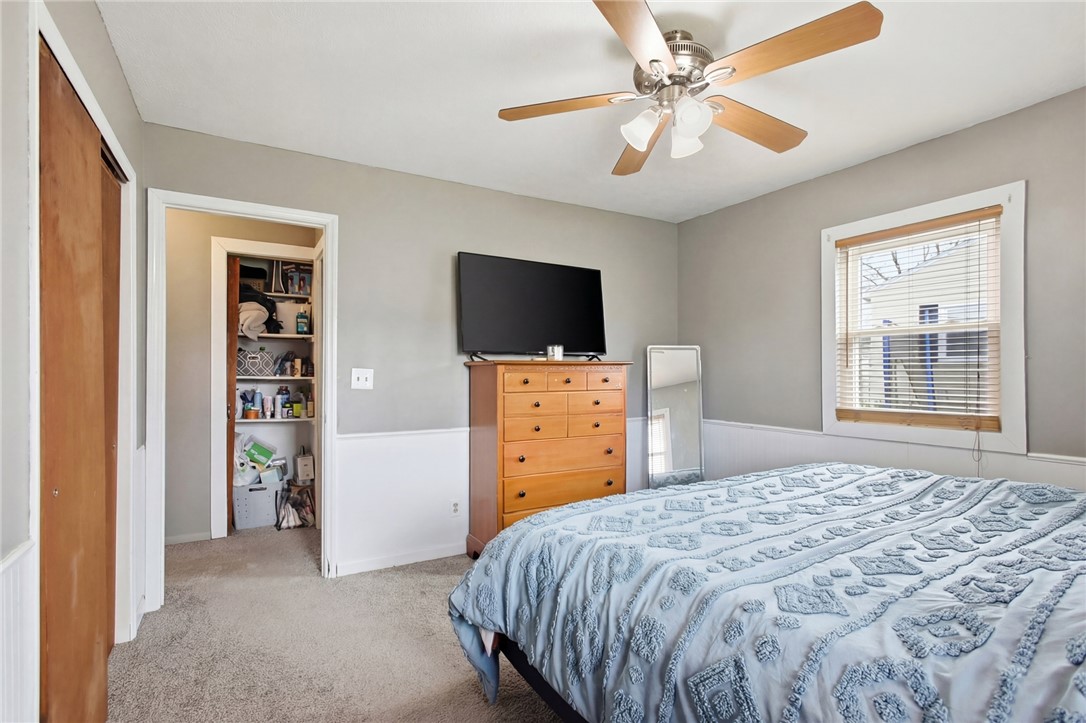 2745 Share Street Springfield, OH 45505 - Photo 18 of 28 This cozy bedroom offers comfort and a well-organized closet space for your storage needs.