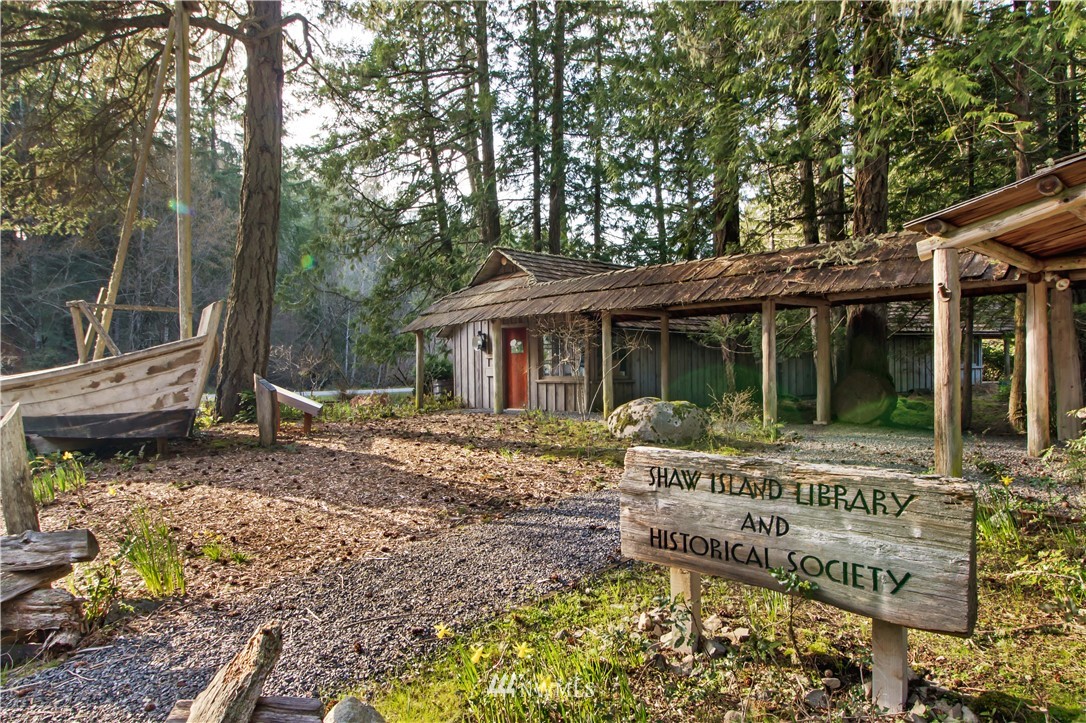 -14xx Neck Point Road Shaw Island, WA 98286 - Photo 17 of 19 a view of a house with backyard sitting area and garden