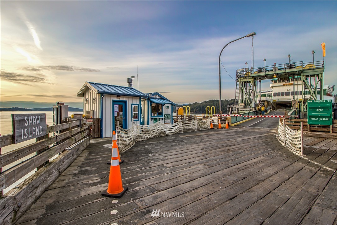 -14xx Neck Point Road Shaw Island, WA 98286 - Photo 19 of 19 a front view of a house with a yard