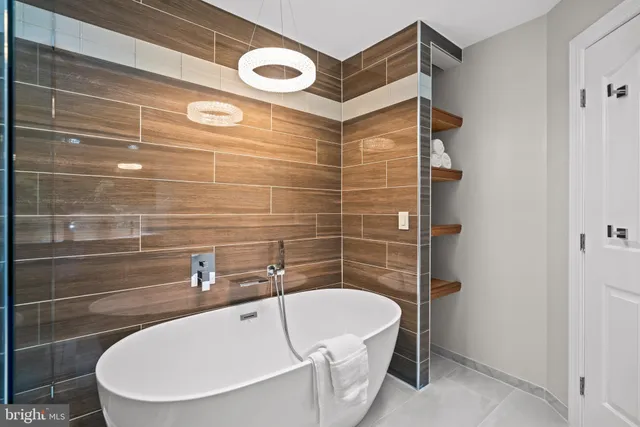 a bathroom with a white bathtub