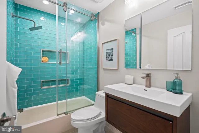 a living room with furniture a rug and a window