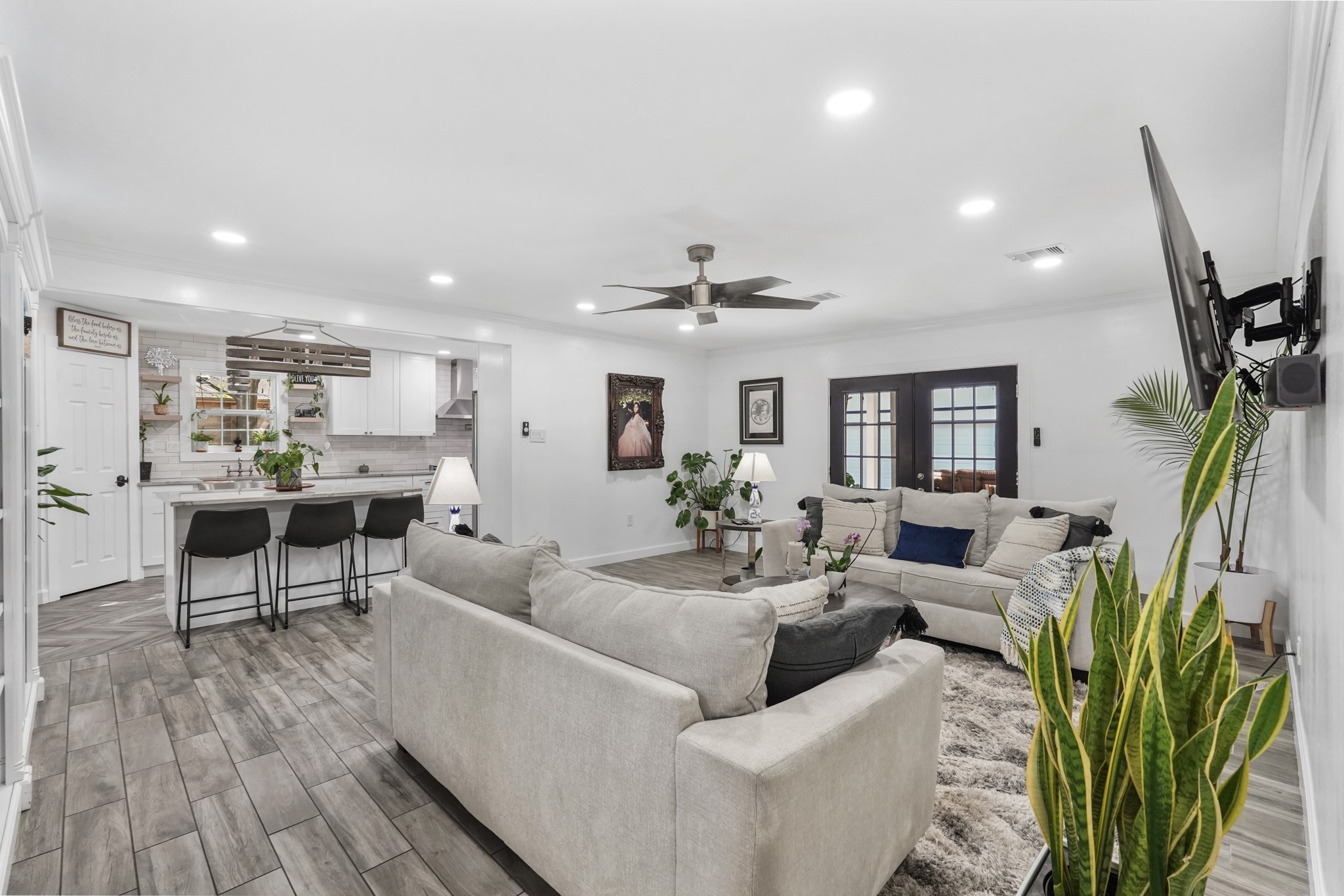 1441 Bingle Road Houston, TX 77055 - Photo 13 of 45 a living room with furniture a wooden floor and a fireplace