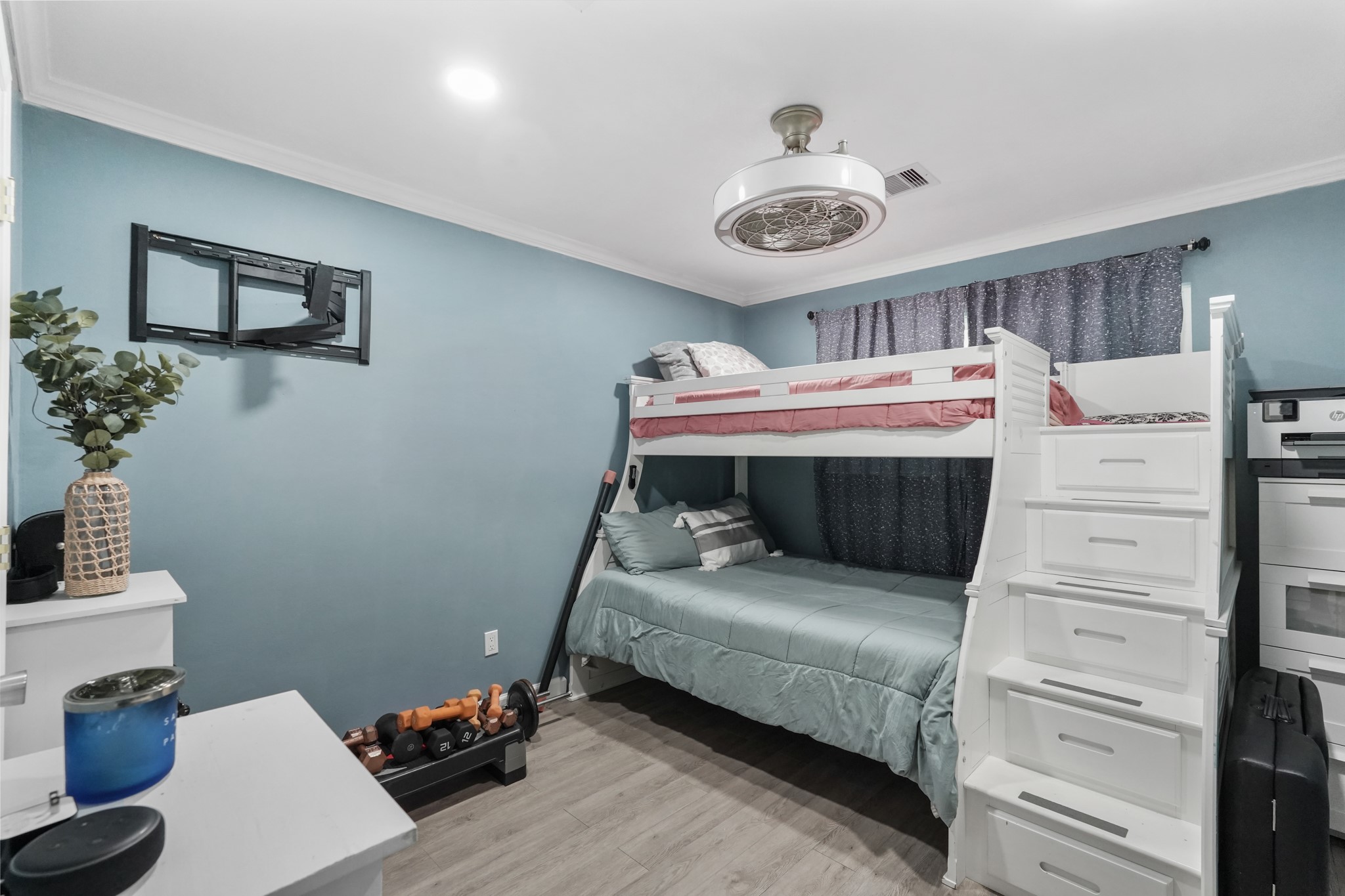 1441 Bingle Road Houston, TX 77055 - Photo 31 of 46 a bedroom with a bed and a chandelier