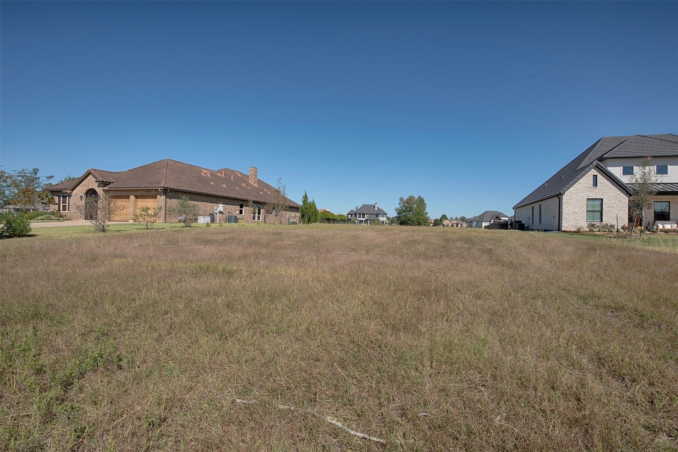 11690 Renaissance Drive Montgomery, TX 77356 - Photo 15 of 25 a view of a house with a yard and mountain view