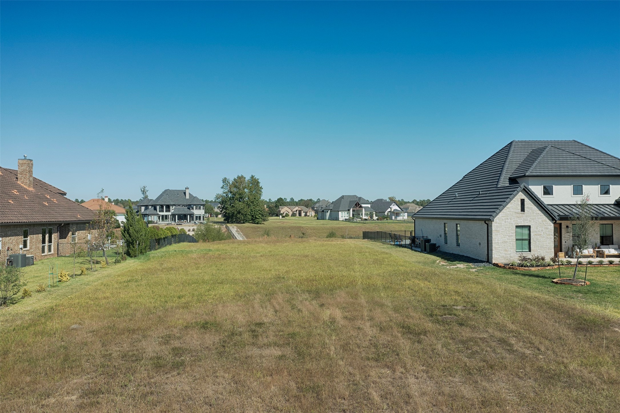 11690 Renaissance Drive Montgomery, TX 77356 - Photo 2 of 25 front view of a house with a yard