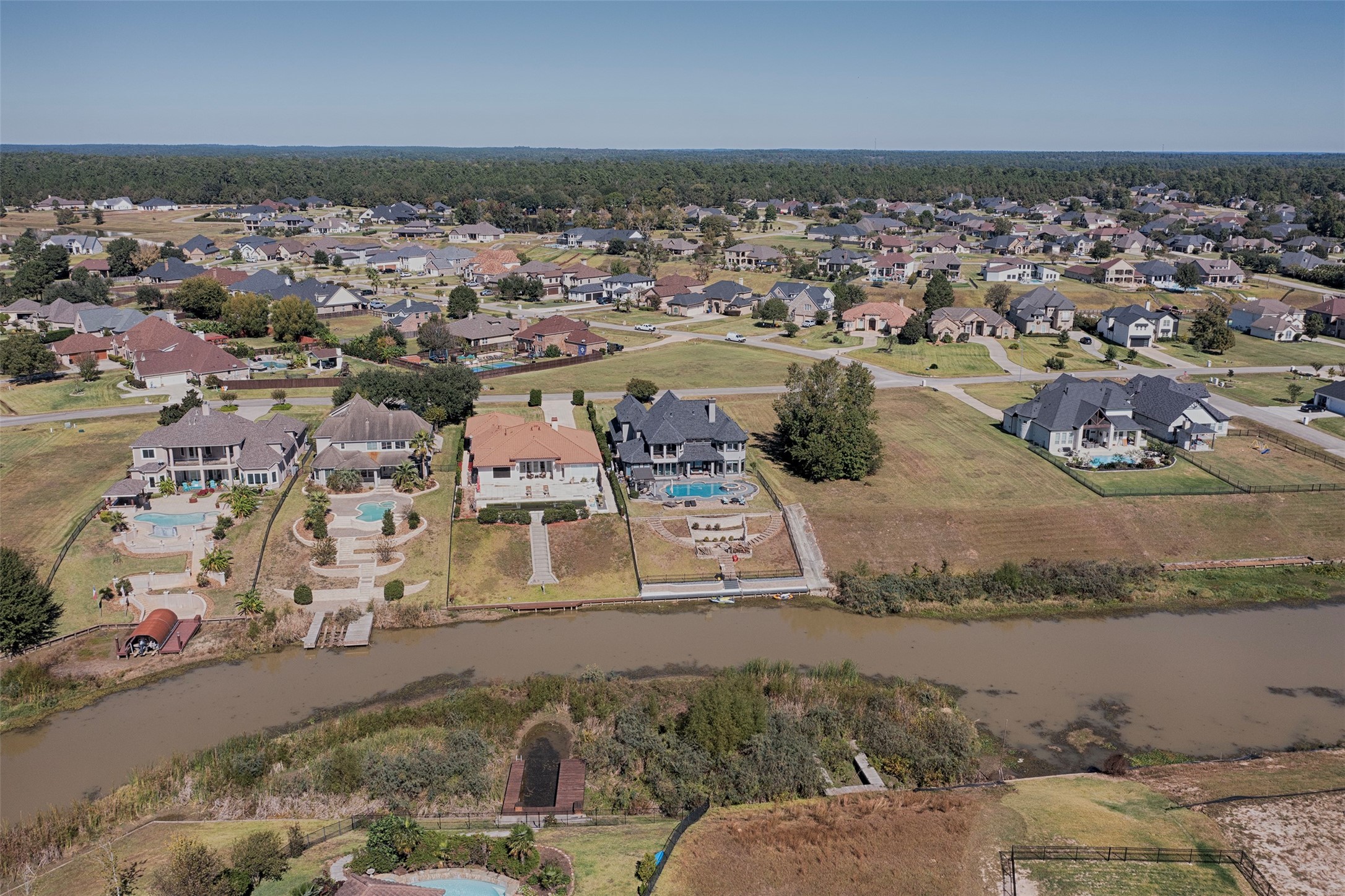 11690 Renaissance Drive Montgomery, TX 77356 - Photo 4 of 25 an aerial view of a house with a lake view