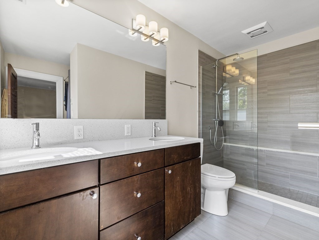 6 Appleby Road Wellesley, MA 02482 - Photo 12 of 21 a bathroom with a sink a toilet and shower
