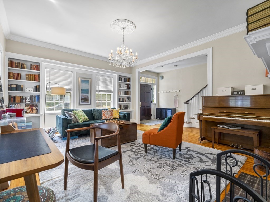 6 Appleby Road Wellesley, MA 02482 - Photo 3 of 21 a living room with furniture a piano and a chandelier