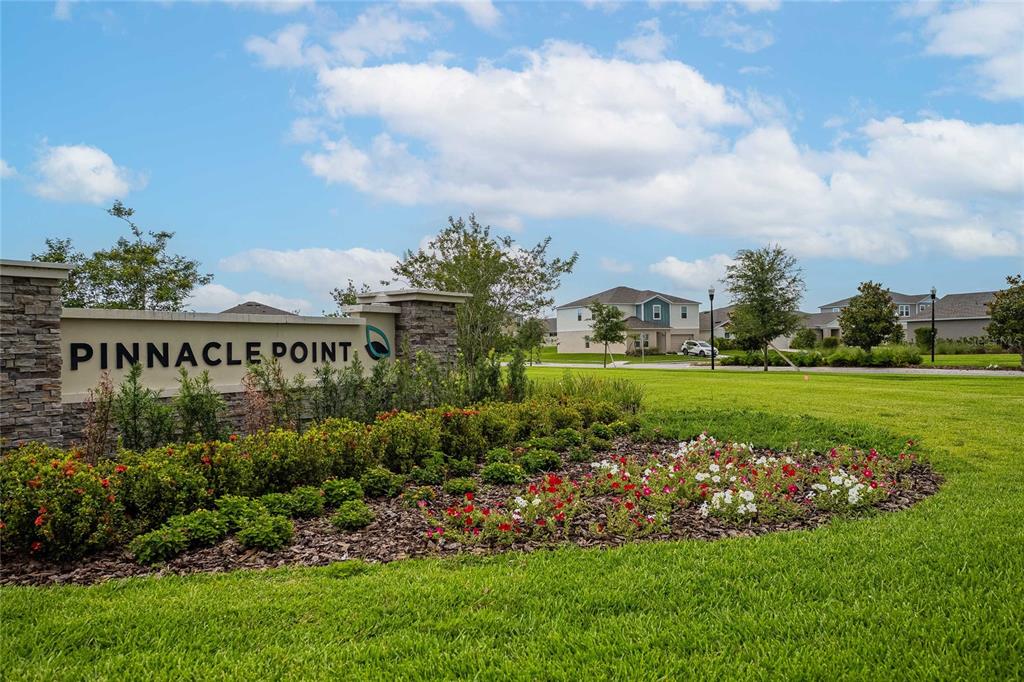 1719 Durden Road Winter Haven, FL 33880 - Photo 2 of 39 a view of a golf course with a garden