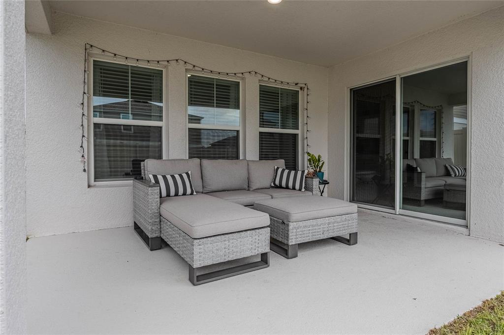 1719 Durden Road Winter Haven, FL 33880 - Photo 33 of 39 a living room with furniture and a large window