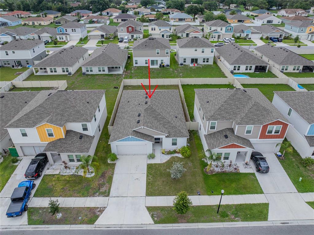 1719 Durden Road Winter Haven, FL 33880 - Photo 38 of 39 an aerial view of residential houses with outdoor space