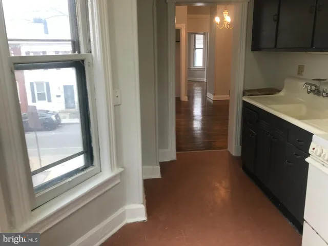 a view of hallway with windows