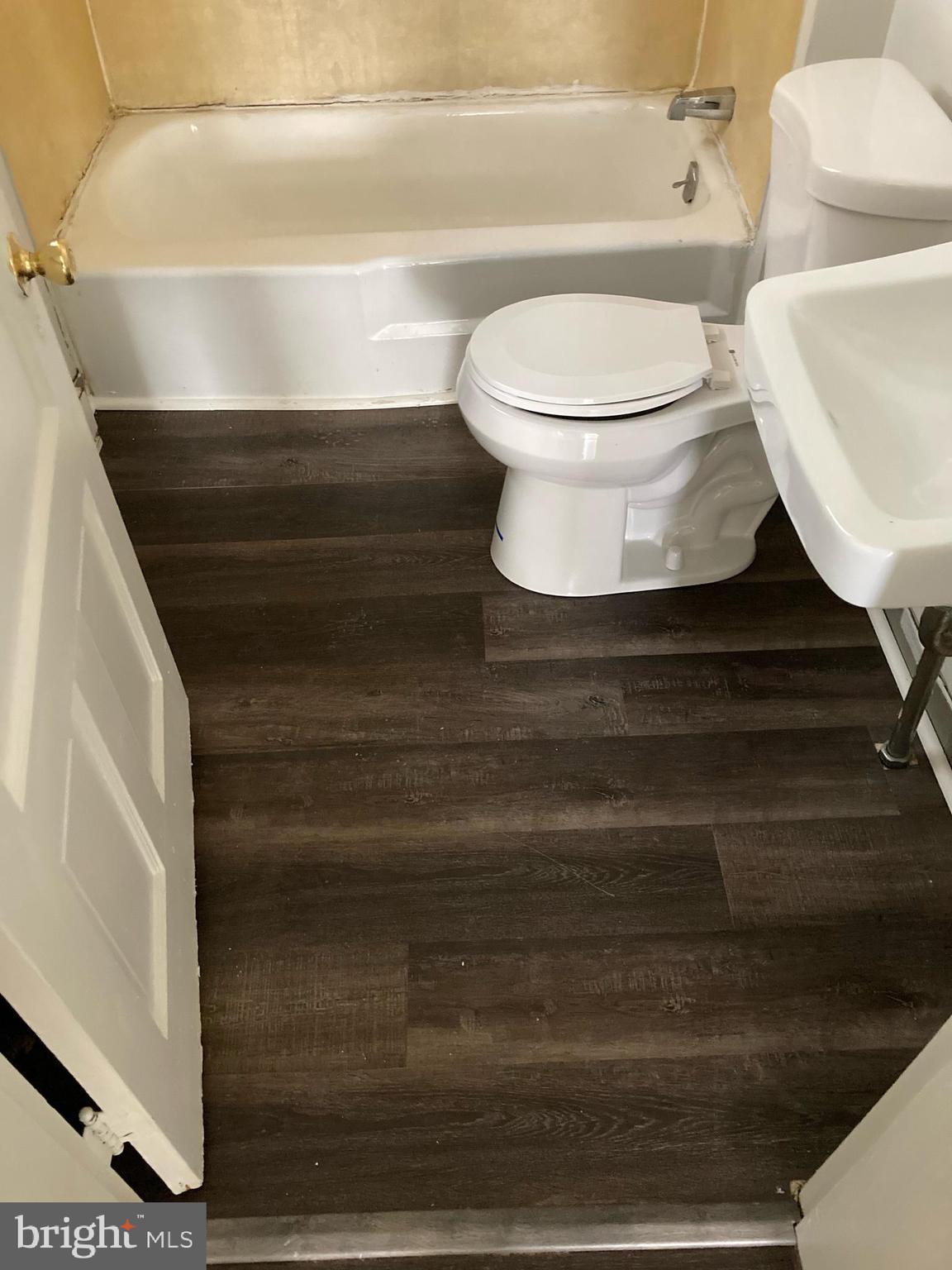 25 South Locust Street Hagerstown, MD 21740 - Photo 34 of 54 a bathroom with a toilet and a shower