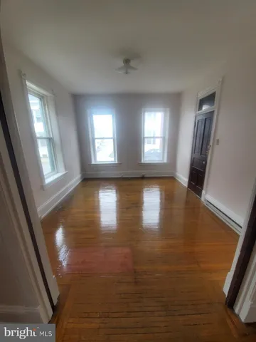 a view of livingroom with hardwood floor and window