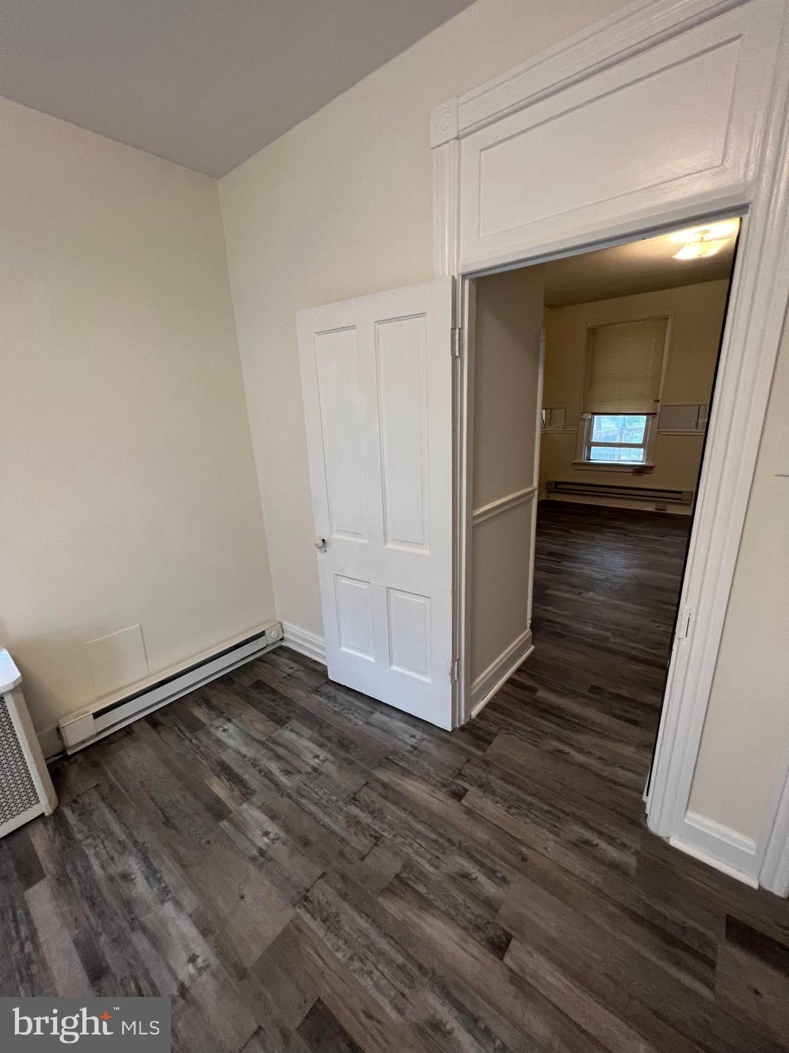 25 South Locust Street Hagerstown, MD 21740 - Photo 53 of 54 a view of a livingroom with wooden floor
