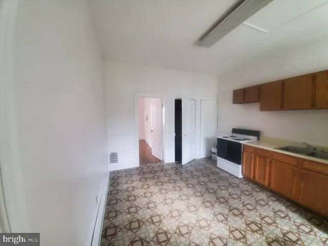 a view of balcony with wooden floor