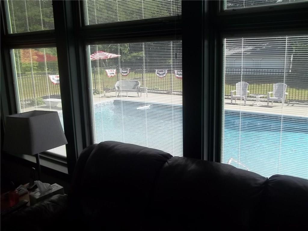 12 Outlet Road Augusta, ME 04330 - Photo 16 of 35 Family room with view to pool