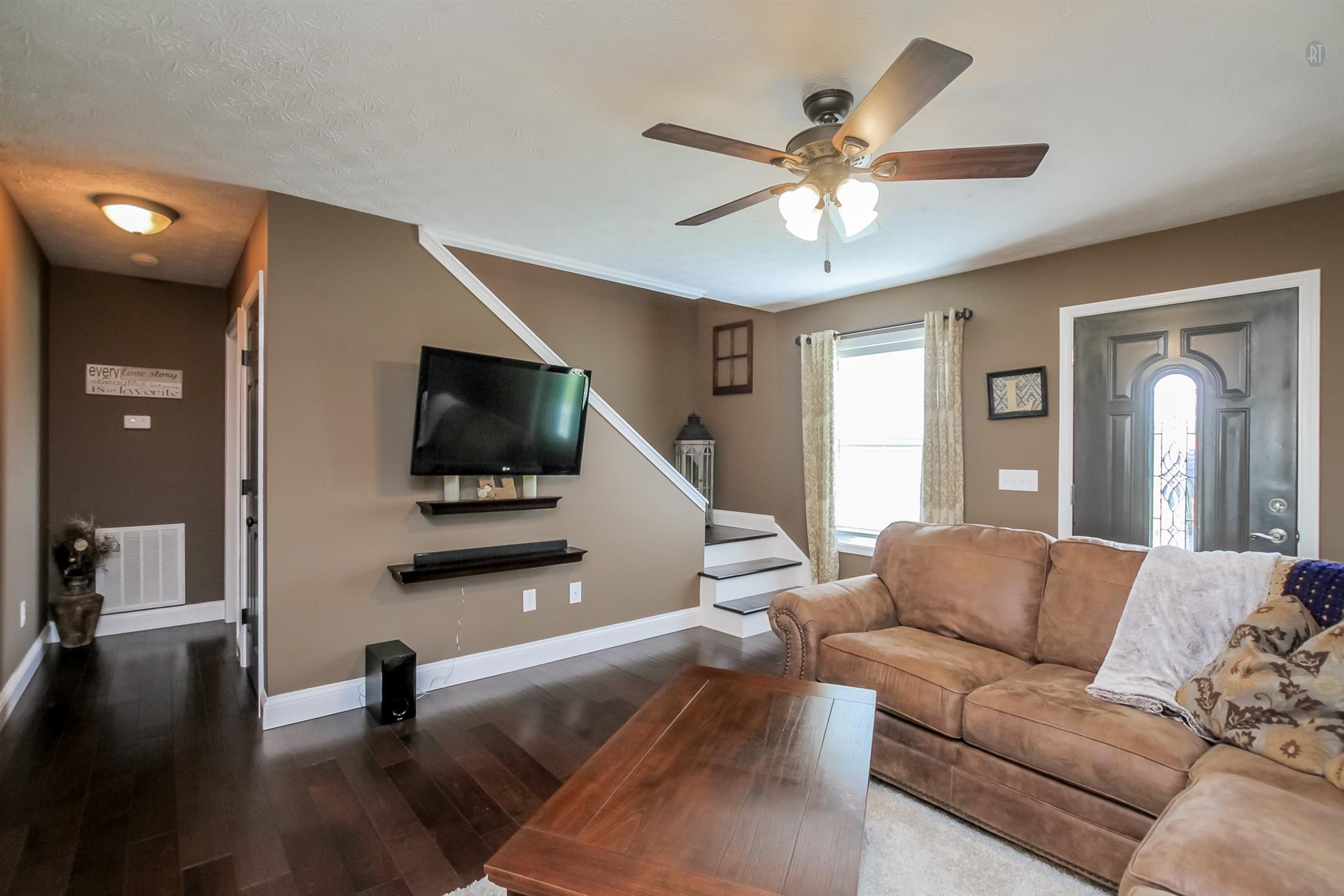 6144 South Lamont Road Springfield, TN 37172 - Photo 3 of 29 a living room with furniture and a flat screen tv