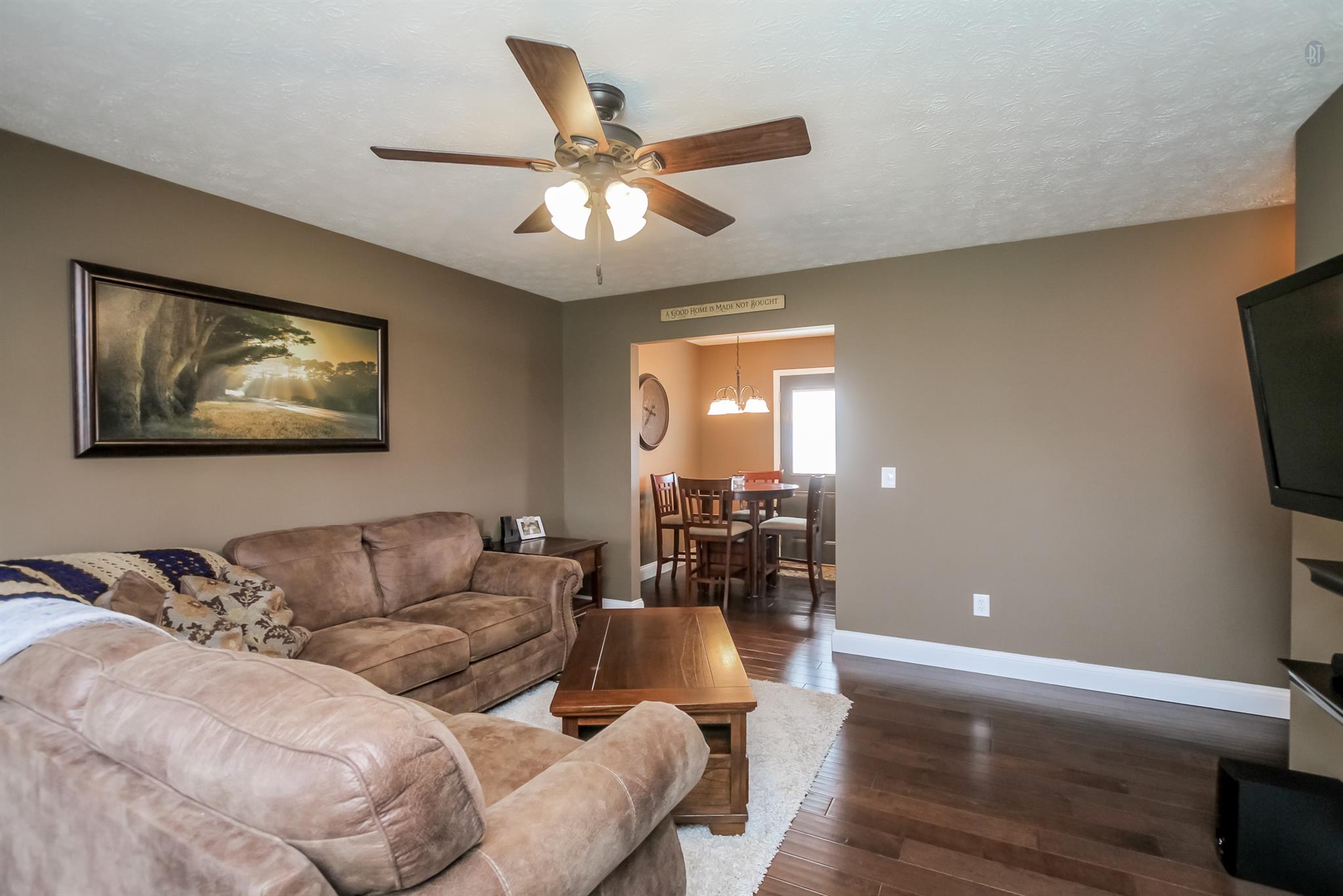 6144 South Lamont Road Springfield, TN 37172 - Photo 4 of 29 a living room with furniture and a flat screen tv