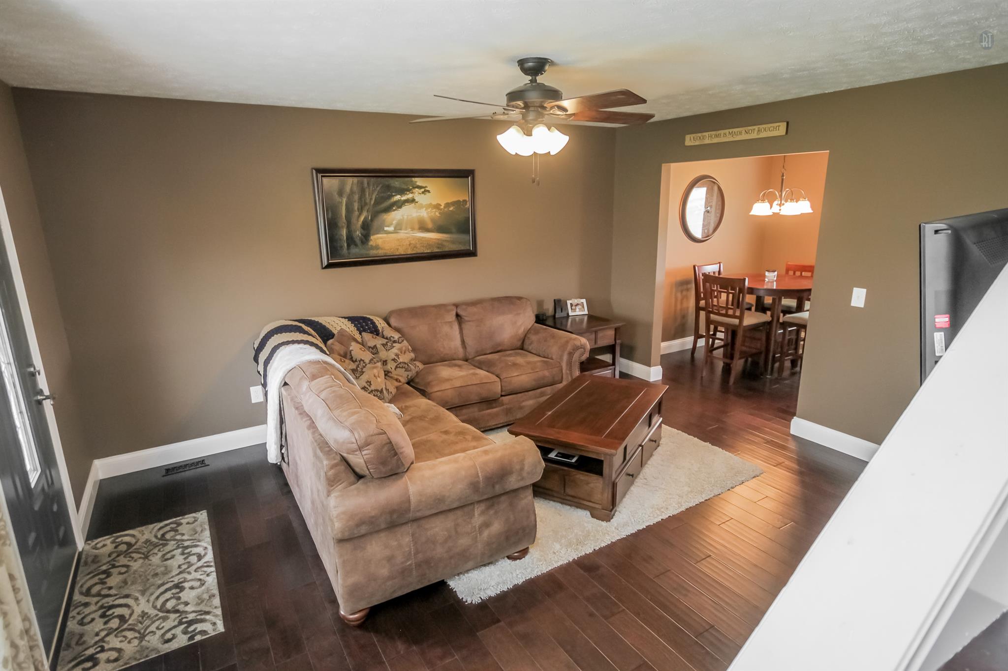 6144 South Lamont Road Springfield, TN 37172 - Photo 6 of 29 a living room with furniture and wooden floor