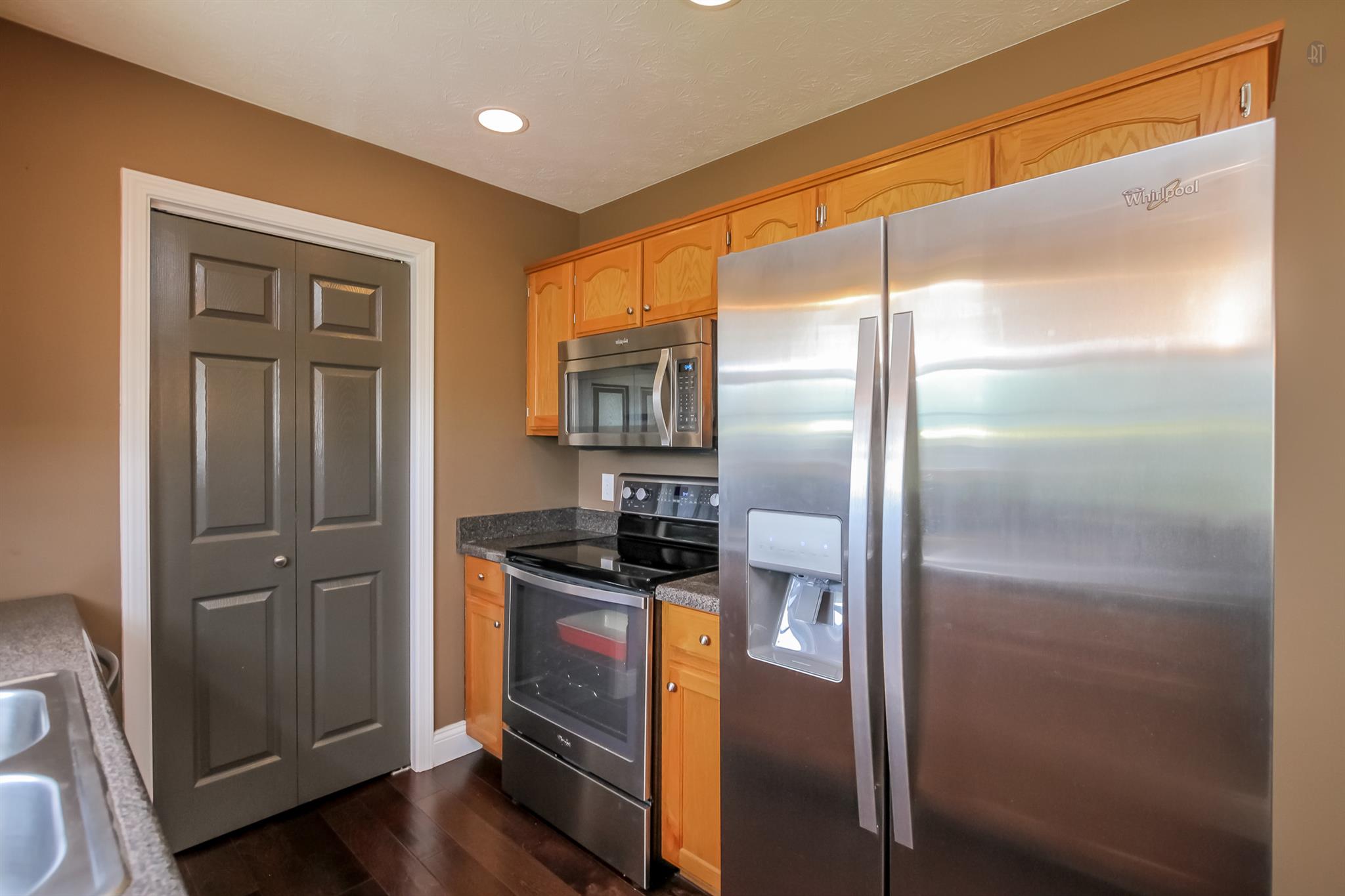 6144 South Lamont Road Springfield, TN 37172 - Photo 8 of 29 a kitchen with metallic refrigerator freezer and a dishwasher