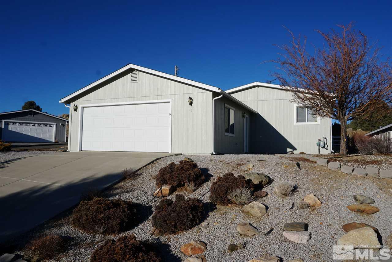 118 Walker Street Gardnerville, NV 89410 - Photo 1 of 20 a view of a house with a snow in the background