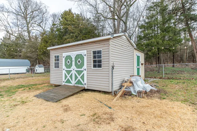 a house with trees in front of it
